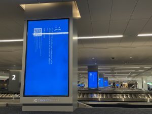 LGA baggage claim display with error message on it after CrowdStrike outage