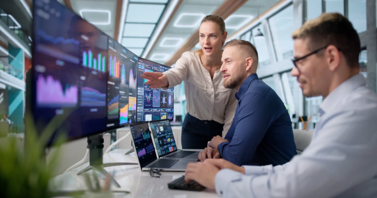 coworkers collaborating in dashboards