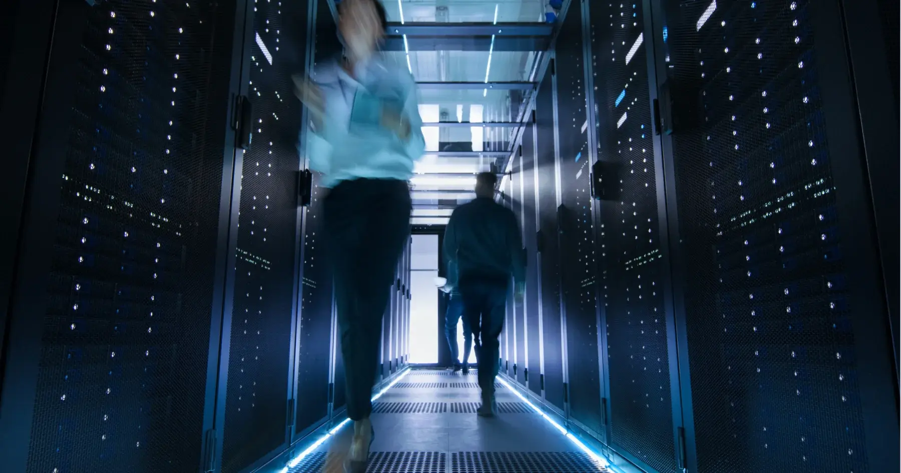 people walking in in data center